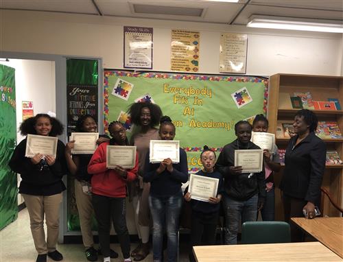 students receive certificates with mentors 